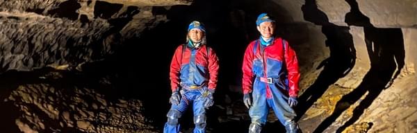 Cavers Exploring Derbyshire Cave