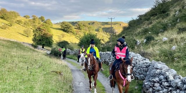 Horses riding through Royston Grange